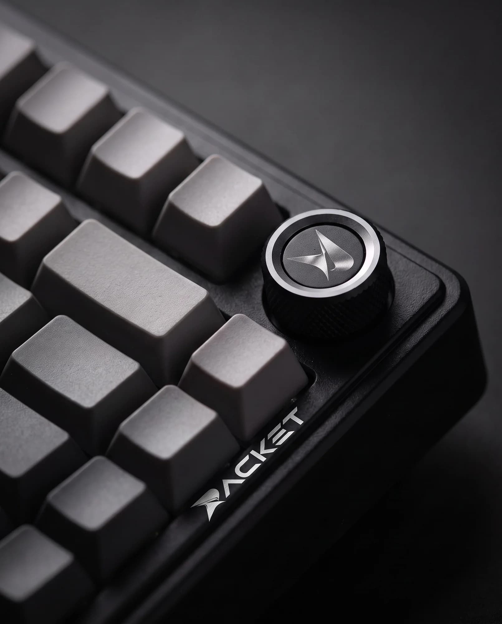 RACKET K75 in Midnight, close-up of the keycaps and knob